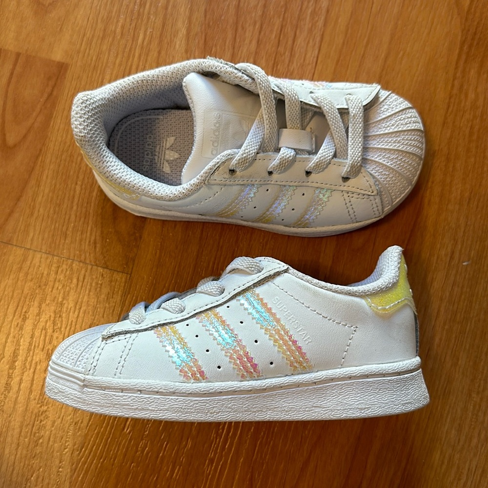 White and iridescent adidas superstars